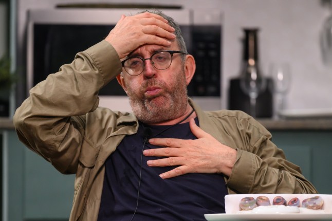 Reverend Richard Coles looking extremely ill after an eating trial on I'm A Celebrity.