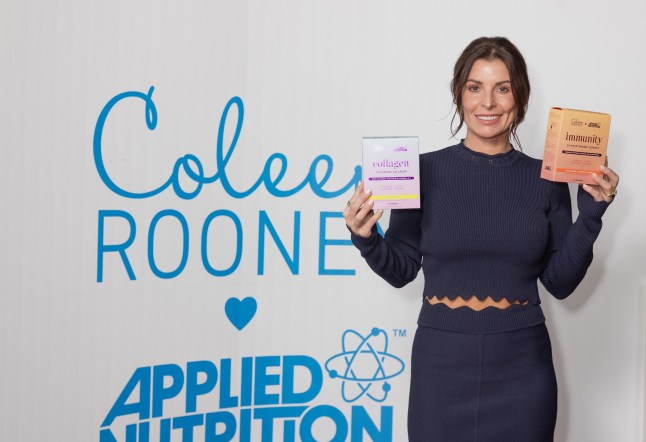 LONDON, ENGLAND - JANUARY 16: Coleen Rooney holds products from the launch of Coleen Rooney x Applied Nutrition Wellness Range at White City House on January 16, 2025 in London, England. (Photo by Jo Hale/Getty Images)