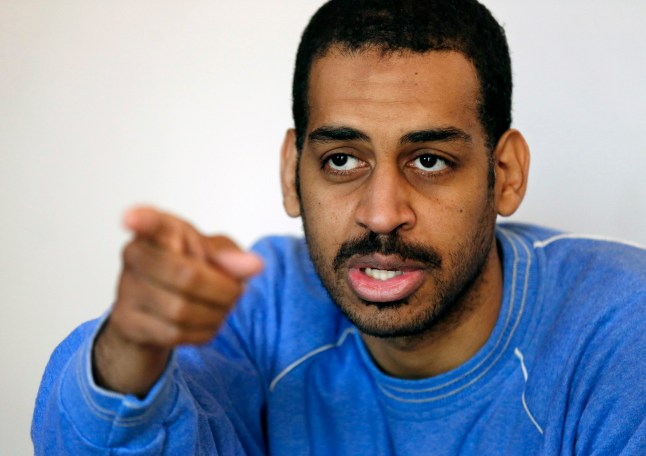 FILE - In this Friday, March 30, 2018, file photo, Alexanda Amon Kotey, allegedly among four British jihadis who made up a brutal Islamic State cell dubbed "The Beatles," speaks during an interview with The Associated Press at a security center in Kobani, Syria. Kotey, one of two British nationals charged with joining with the Islamic State group and conspiring to torture and behead American and European hostages in Syria, is scheduled to plead guilty to criminal charges, Thursday, Sept. 2, 2021, in U.S. District Court in Alexandria, Va. (AP Photo/Hussein Malla, File)