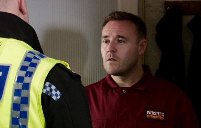 Tyrone Dobbs chats to a police officer in Coronation Street