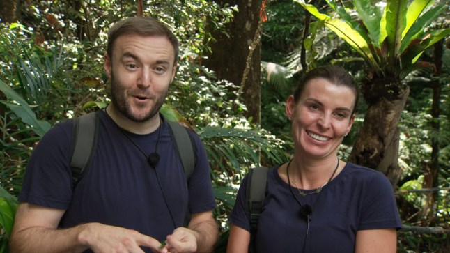 Alan Halsall and Coleen Rooney chat to camera in the I'm A Celebrity jungle