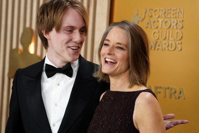 Christopher "Kit" Bernard Foster, left, and Jodie Foster arrive at the 31st annual Screen Actors Guild Awards on Sunday, Feb. 23, 2025, at the Shrine Auditorium in Los Angeles. (Photo by Jordan Strauss/Invision/AP)