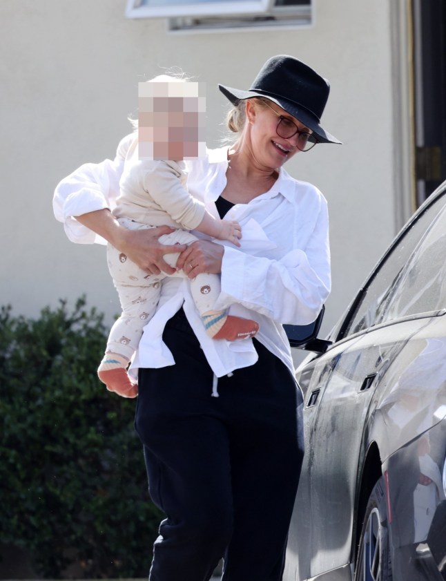 Santa Barbara, CA - *PREMIUM-EXCLUSIVE* - Actress Cameron Diaz is seen enjoying motherhood as she leaves a restaurant in Santa Barbara with her nearly 1-year-old son Cardinal, showing off her newest family addition with Benjo Madden for the first time since giving birth. Shot on 02/22/25 Pictured: Cameron Diaz BACKGRID USA 24 FEBRUARY 2025 BYLINE MUST READ: Clint Brewer Photography / BACKGRID USA: +1 310 798 9111 / usasales@backgrid.com UK: +44 208 344 2007 / uksales@backgrid.com *UK Clients - Pictures Containing Children Please Pixelate Face Prior To Publication*