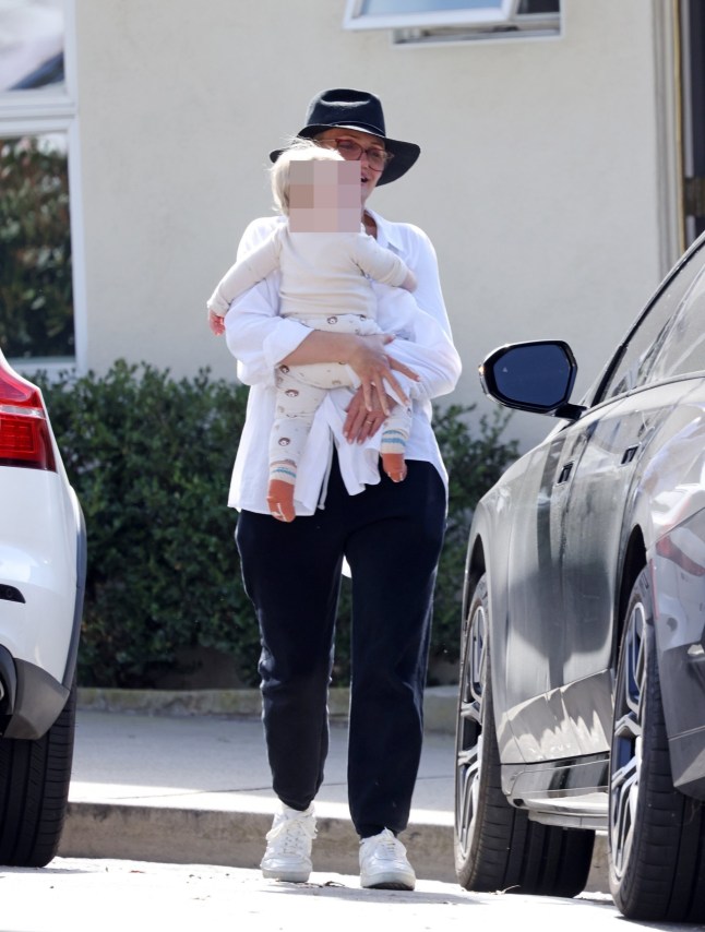Santa Barbara, CA - *PREMIUM-EXCLUSIVE* - Actress Cameron Diaz is seen enjoying motherhood as she leaves a restaurant in Santa Barbara with her nearly 1-year-old son Cardinal, showing off her newest family addition with Benjo Madden for the first time since giving birth. Shot on 02/22/25 Pictured: Cameron Diaz BACKGRID USA 24 FEBRUARY 2025 BYLINE MUST READ: Clint Brewer Photography / BACKGRID USA: +1 310 798 9111 / usasales@backgrid.com UK: +44 208 344 2007 / uksales@backgrid.com *UK Clients - Pictures Containing Children Please Pixelate Face Prior To Publication*
