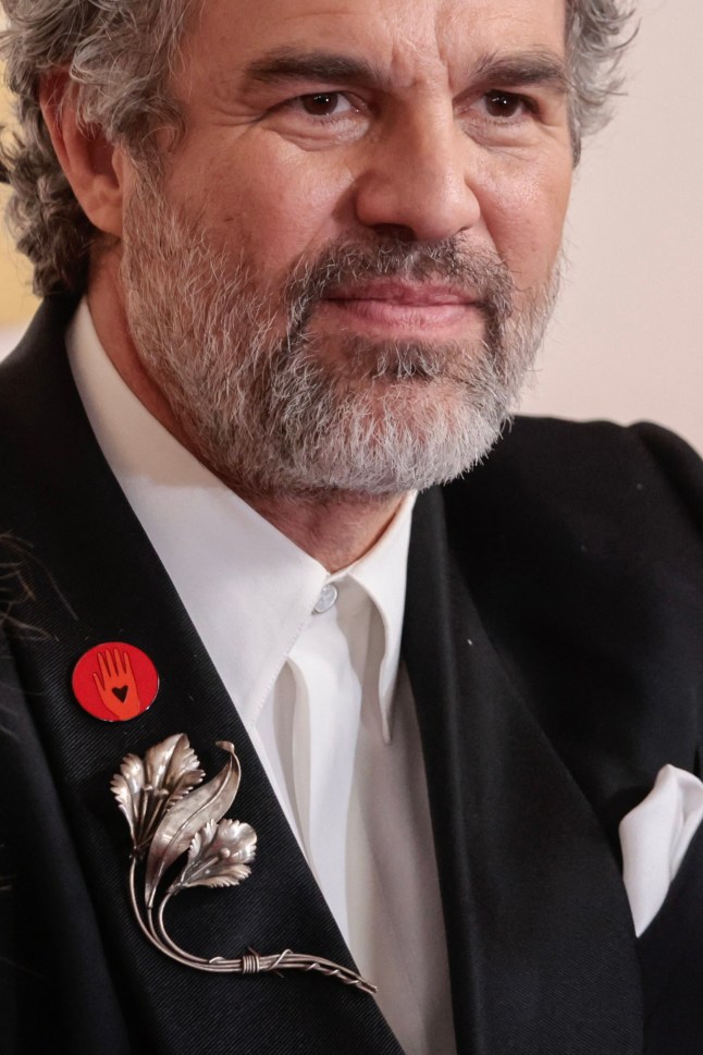 TOPSHOT - US actor Mark Ruffalo wears an "Artists4Ceasefire" pin, calling for de-escalation and ceasefire in Gaza and Israel as he attends the 96th Annual Academy Awards at the Dolby Theatre in Hollywood, California on March 10, 2024. (Photo by DAVID SWANSON / AFP) (Photo by DAVID SWANSON/AFP via Getty Images)