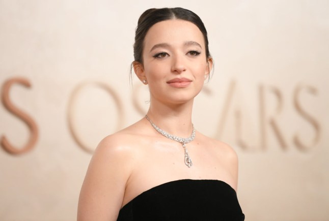 Mikey Madison posing at the 2025 Oscars.