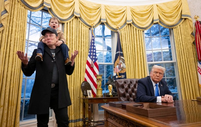 TOPSHOT - Tesla and SpaceX CEO Elon Musk with his son X ?? A-Xii join US President Donald Trump as he signs executive orders in the Oval Office of the White House in Washington, DC, February 11, 2025. Tech billionaire Elon Musk, who has been tapped by President Donald Trump to lead federal cost-cutting efforts, said the United States would go "bankrupt" without budget cuts. Musk leads the efforts under the newly created Department of Government Efficiency (DOGE), and was speaking at the White House with Trump, who has in recent weeks unleashed a flurry of orders aimed at slashing federal spending. (Photo by Jim WATSON / AFP) (Photo by JIM WATSON/AFP via Getty Images)