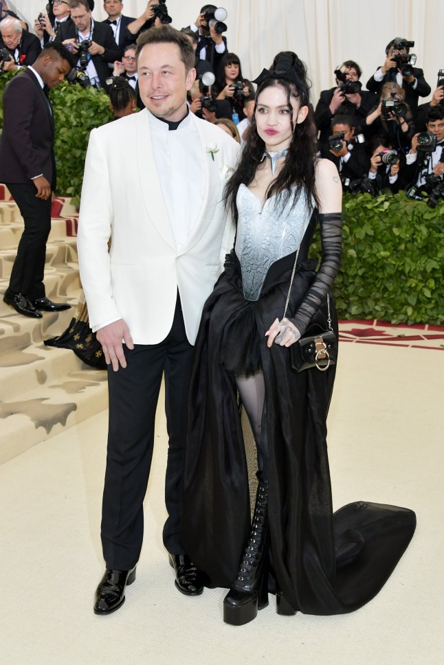 NEW YORK, NY - MAY 07: Elon Musk and Grimes attend the Heavenly Bodies: Fashion & The Catholic Imagination Costume Institute Gala at The Metropolitan Museum of Art on May 7, 2018 in New York City. (Photo by Neilson Barnard/Getty Images)