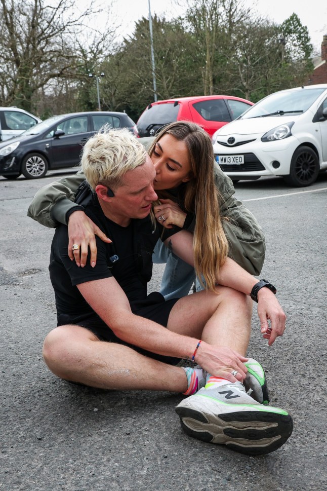 STOCKPORT, ENGLAND - MARCH 21: BBC Radio 1 presenter Jamie Laing with his wife Sophie Habboo during day five of his 2025 Comic Relief challenge at the Bulls Head Pub on March 21, 2025 in Stockport, England. Radio 1's "Ultra Marathon Man with Jamie Laing" for Red Nose Day, will see Jamie conquering daily ultra-marathons across a 5-day stretch, seeing the host run more than 150 miles from London to Salford, Manchester. (Photo by Tristan Fewings/Comic Relief/Getty Images)