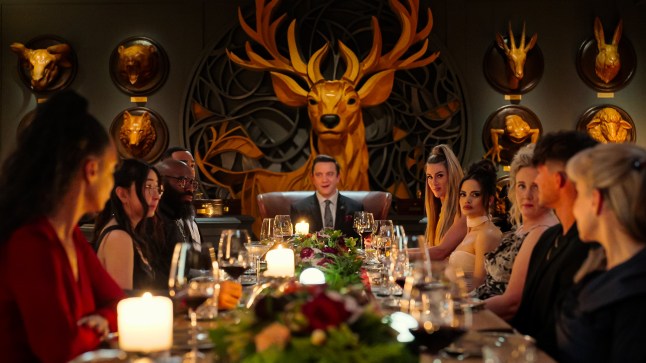 Million Dollar Secret. (L to R) Contestants Se Young Metzroth, Phillip Roundtree, Cory Niles, host Peter Serafinowicz, Sydnee Falkner, Samantha Hubbard and Lauren Trefethren in episode 102 of Million Dollar Secret. Credit: Courtesy of Netflix/?? 2025 Netflix, Inc.