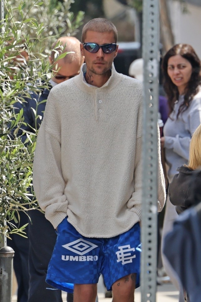 West Hollywood, CA - *EXCLUSIVE* - Justin Bieber keeps it casual with a relaxed cream street paired with Umbro Basketball shorts, Bottega Veneta ankle boots ($1200) and $39 Le Specs for lunch at Dialog Caf?? in West Hollywood. March 30, 2025 Pictured: Justin Bieber BACKGRID USA 31 MARCH 2025 USA: +1 310 798 9111 / usasales@backgrid.com UK: +44 208 344 2007 / uksales@backgrid.com *UK Clients - Pictures Containing Children Please Pixelate Face Prior To Publication*