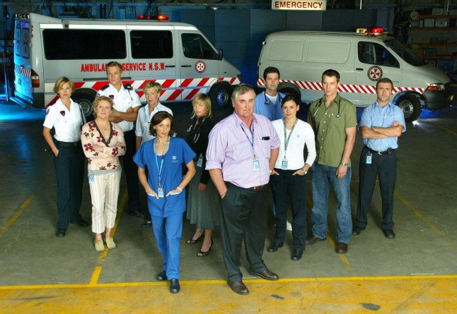 Doctors and nurses standing outside a hospital next to ambulances in Australian media drama All Saints
