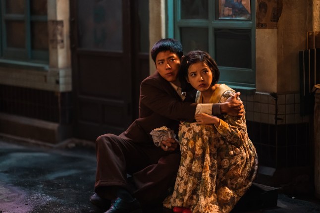 When Life Gives You Tangerines (L to R) Park Bo-gum as Yang Gwan-sik, IU as Oh Ae-sun in When Life Gives You Tangerines Cr. Yoo Eun-mi/Netflix ?? 2025