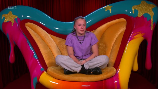 Tearful JoJo Siwa comforted by Chris Hughes after 'confusing' letter from partner
