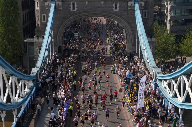 The masses crossing Tower Bridge during the TCS London Marathon. Picture date: Sunday April 27, 2025. PA Photo. See PA story ATHLETICS London Photo credit should read: Jonathan Brady/PA Wire. RESTRICTIONS: Use subject to restrictions. Editorial use only, no commercial use without prior consent from rights holder.