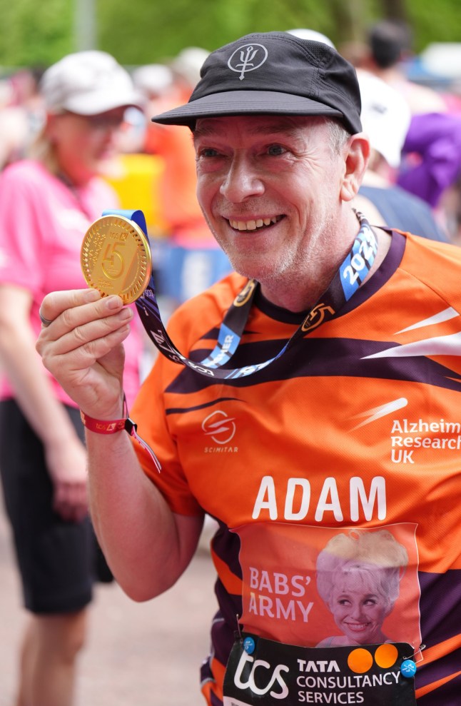 Adam Woodyatt after crossing the finish line during the TCS London Marathon. Picture date: Sunday April 27, 2025. PA Photo. See PA story ATHLETICS London Photo credit should read: John Walton/PA Wire. RESTRICTIONS: Use subject to restrictions. Editorial use only, no commercial use without prior consent from rights holder.