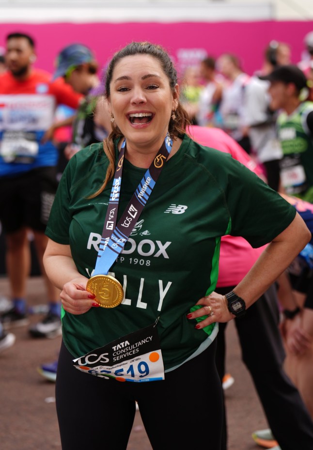 Kelly Brook after crossing the finish line during the TCS London Marathon. Picture date: Sunday April 27, 2025. PA Photo. See PA story ATHLETICS London Photo credit should read: John Walton/PA Wire. RESTRICTIONS: Use subject to restrictions. Editorial use only, no commercial use without prior consent from rights holder.