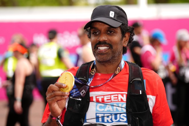 Romesh Ranganathan after crossing the finish line during the TCS London Marathon. Picture date: Sunday April 27, 2025. PA Photo. See PA story ATHLETICS London Photo credit should read: John Walton/PA Wire. RESTRICTIONS: Use subject to restrictions. Editorial use only, no commercial use without prior consent from rights holder.