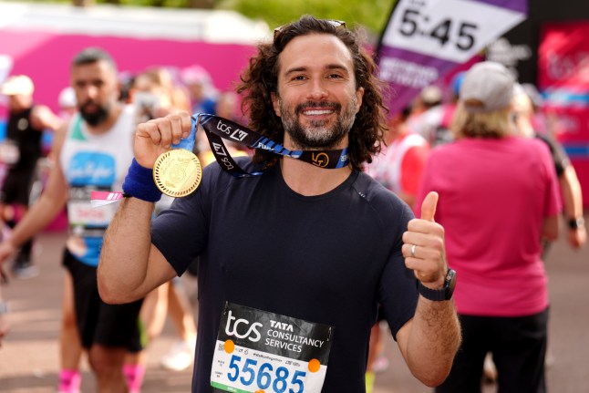 Joe Wicks after crossing the finish line during the TCS London Marathon. Picture date: Sunday April 27, 2025. PA Photo. See PA story ATHLETICS London Photo credit should read: John Walton/PA Wire. RESTRICTIONS: Use subject to restrictions. Editorial use only, no commercial use without prior consent from rights holder.