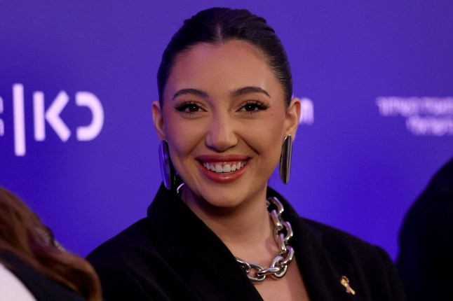Israel's Eurovision 2025 representative and survivor of the October 7, 2023 attack, Yuval Raphael, attends a press conference after premiering her song 'New Day Will Rise' in Tel Aviv, Israel March 9, 2025. REUTERS/Ronen Zvulun