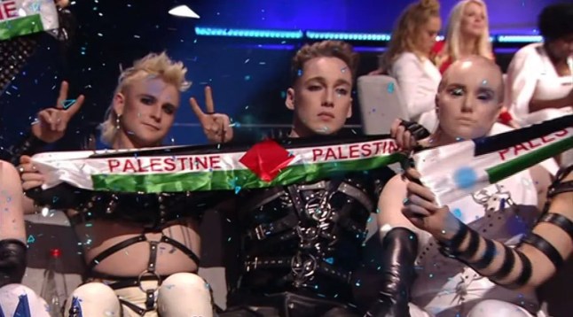 Hatari holding banners supporting Palestine