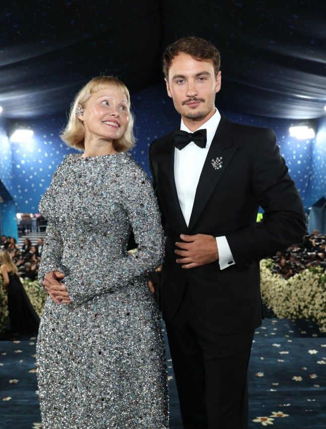 NEW YORK, NEW YORK - MAY 05: (L-R) Pamela Anderson and Brandon Thomas Lee attend the 2025 Met Gala Celebrating "Superfine: Tailoring Black Style" at Metropolitan Museum of Art on May 05, 2025 in New York City. (Photo by Kevin Mazur/MG25/Kevin Mazur/Getty Images for The Met Museum/Vogue)